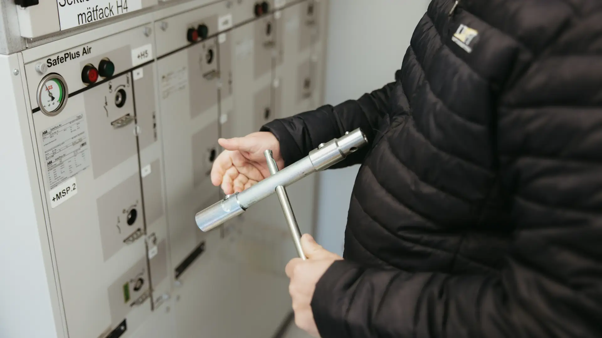 Person holding a tool